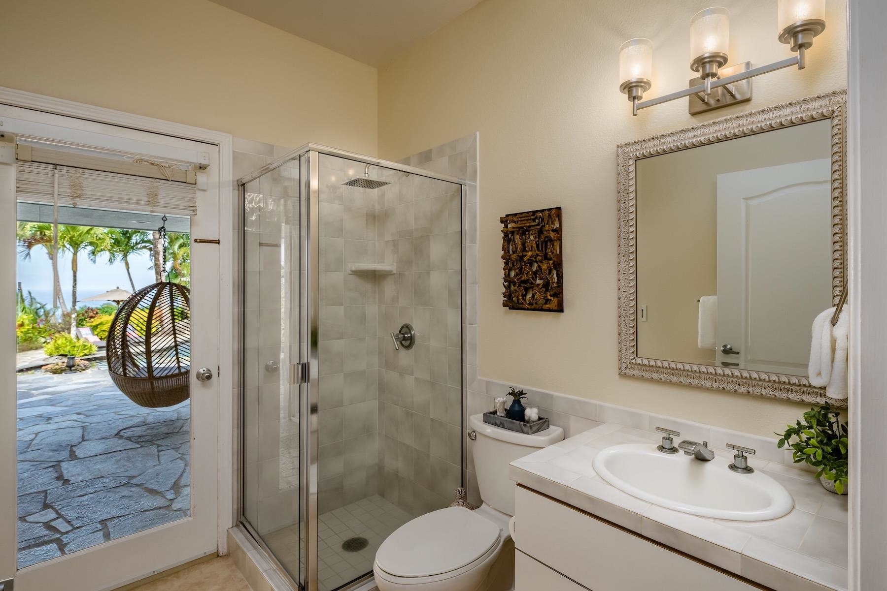 110 Mehana Road Haiku, HI 96708 - Photo 21 of 30 a bathroom with a sink toilet and shower