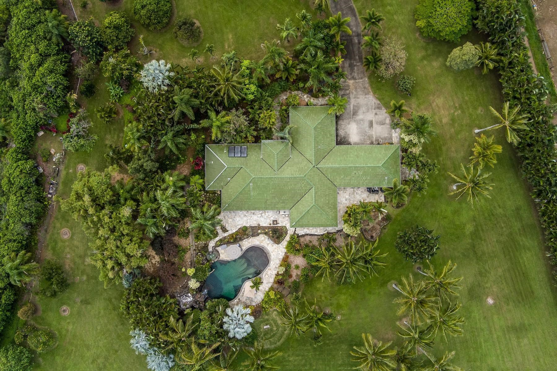 110 Mehana Road Haiku, HI 96708 - Photo 29 of 30 an aerial view of a house with a yard