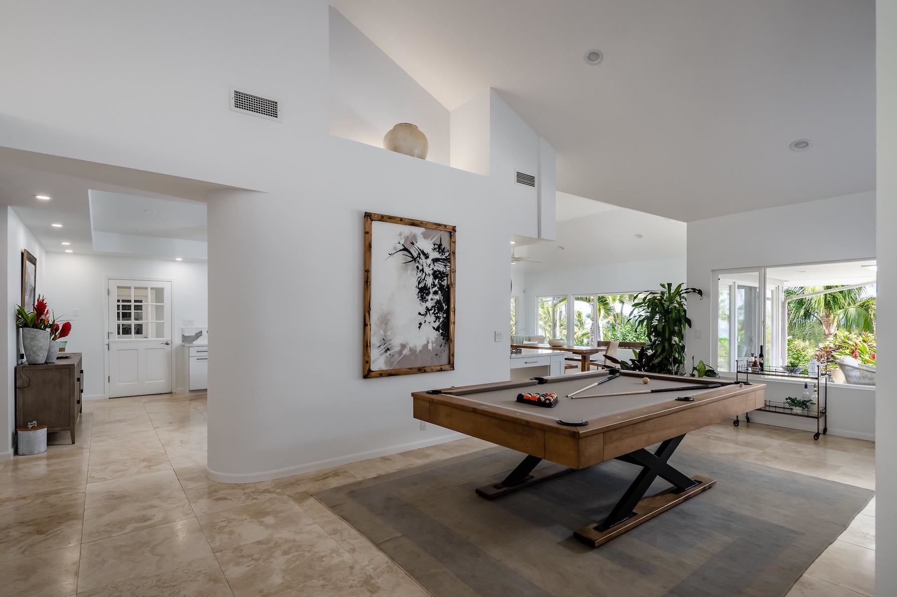 110 Mehana Road Haiku, HI 96708 - Photo 7 of 30 a view of a livingroom with furniture and a potted plant