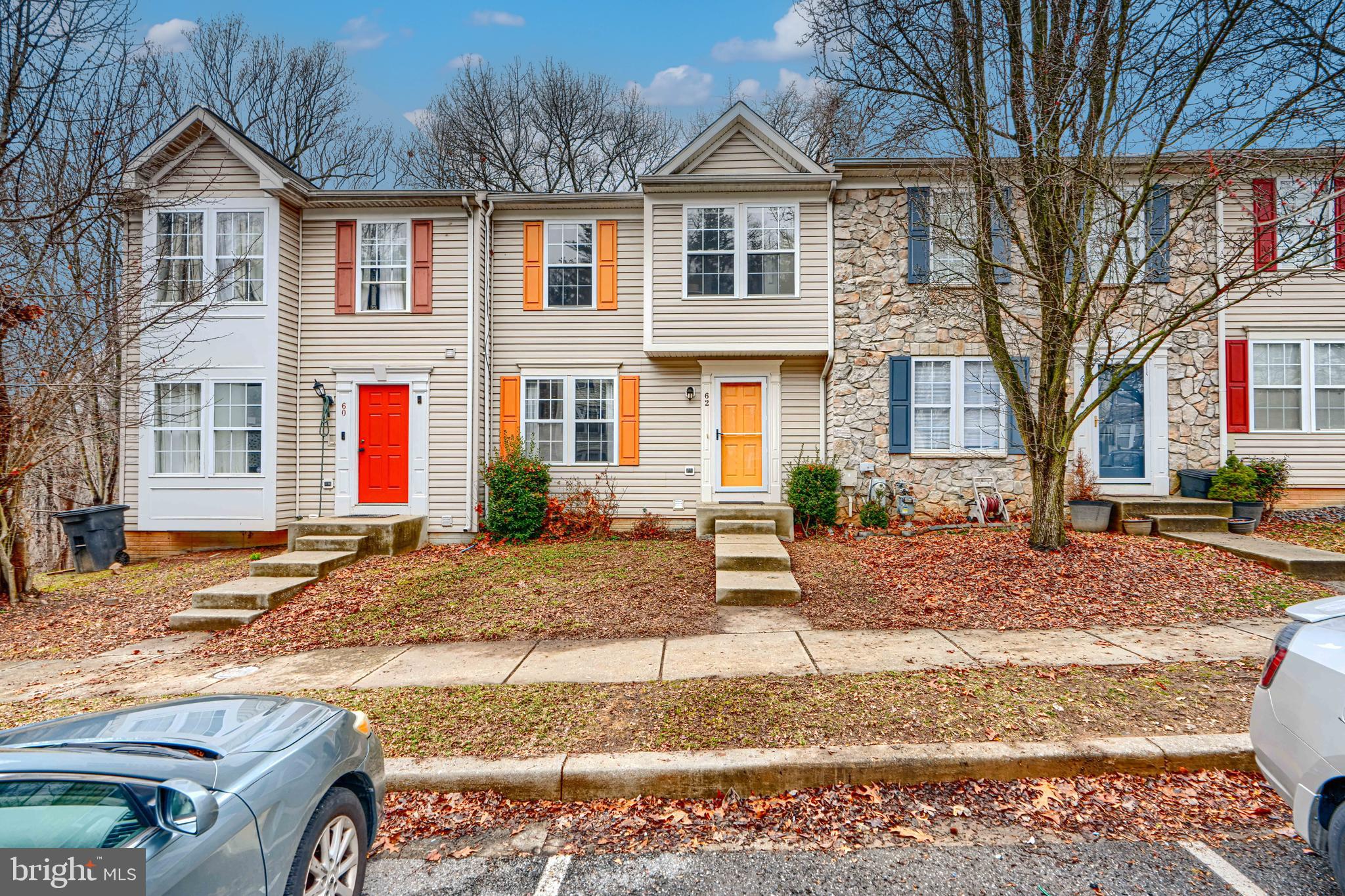 62 Gwynnswood Road Owings Mills, MD 21117 - Photo 2 of 44 a front view of a house with a yard