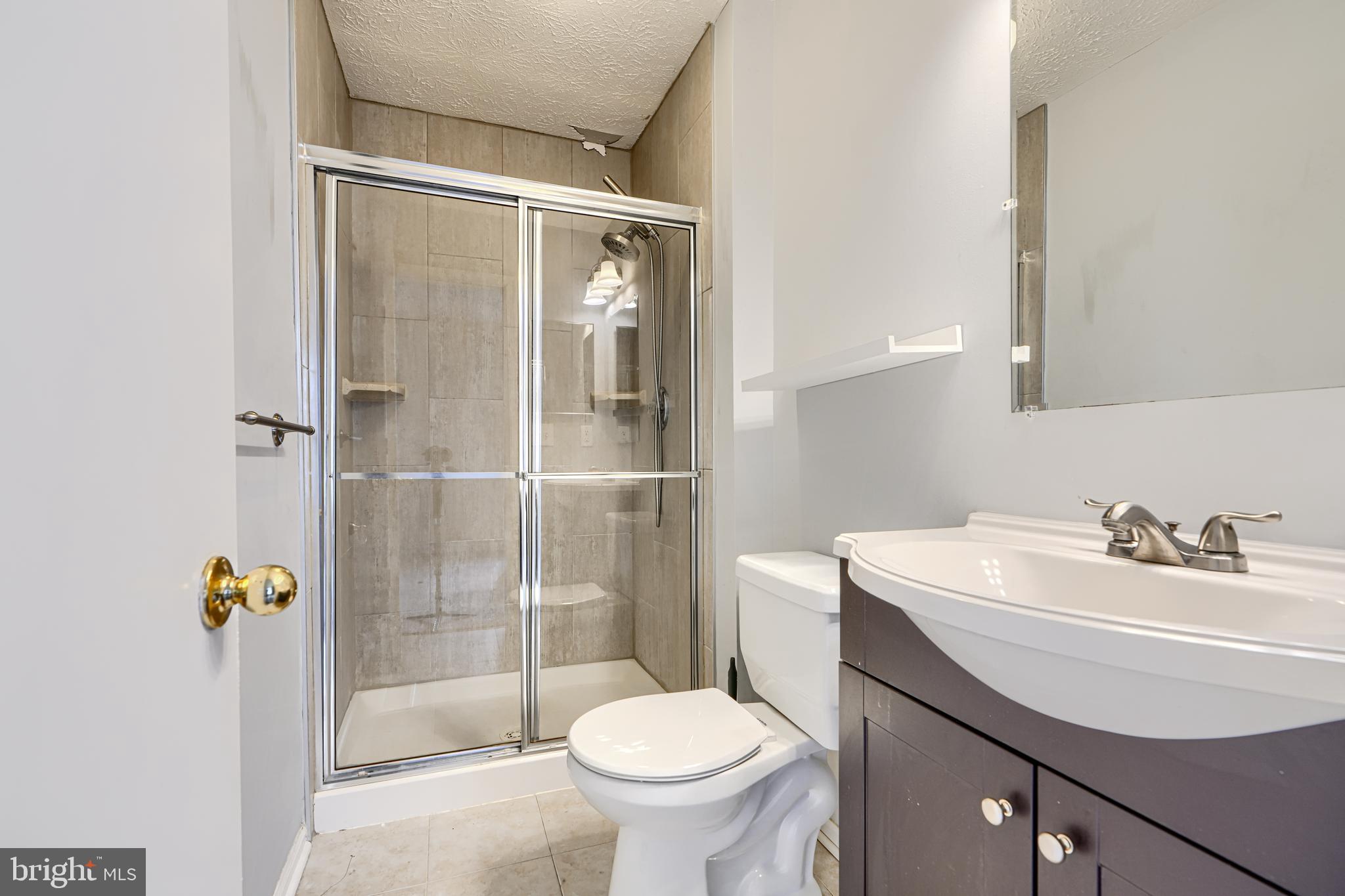 62 Gwynnswood Road Owings Mills, MD 21117 - Photo 22 of 44 a bathroom with a sink toilet and shower