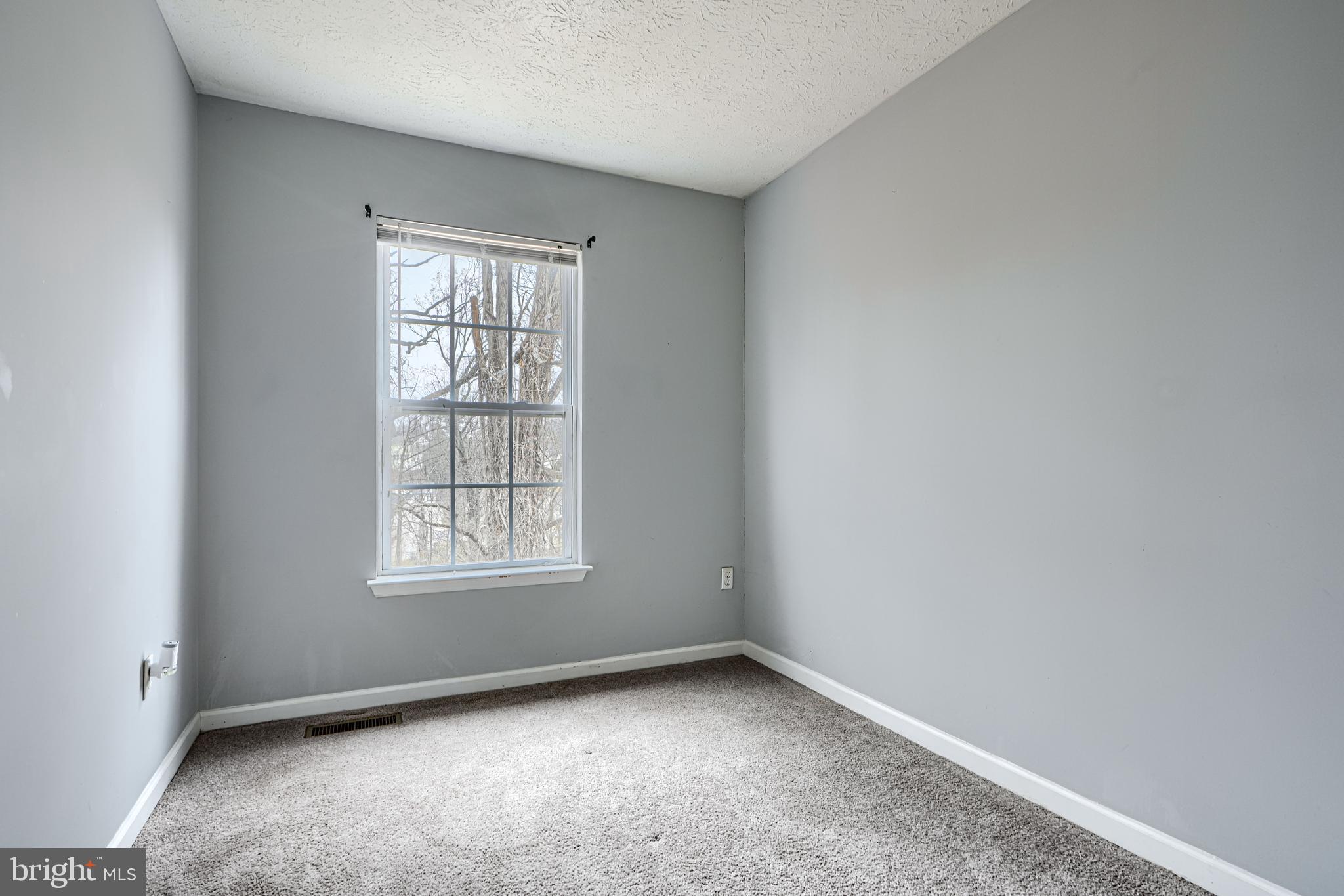 62 Gwynnswood Road Owings Mills, MD 21117 - Photo 24 of 44 an empty room with a window
