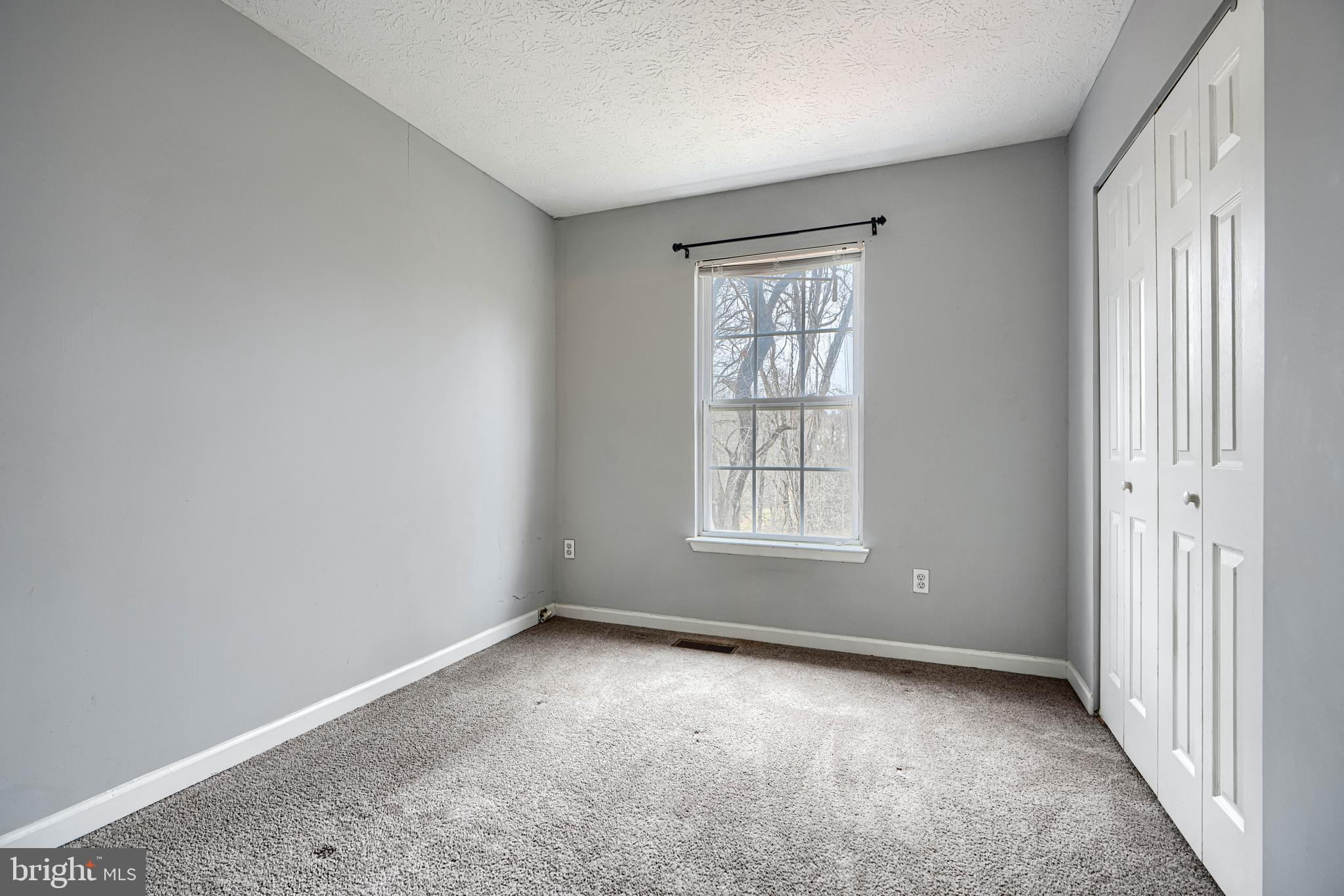 62 Gwynnswood Road Owings Mills, MD 21117 - Photo 28 of 44 an empty room with windows