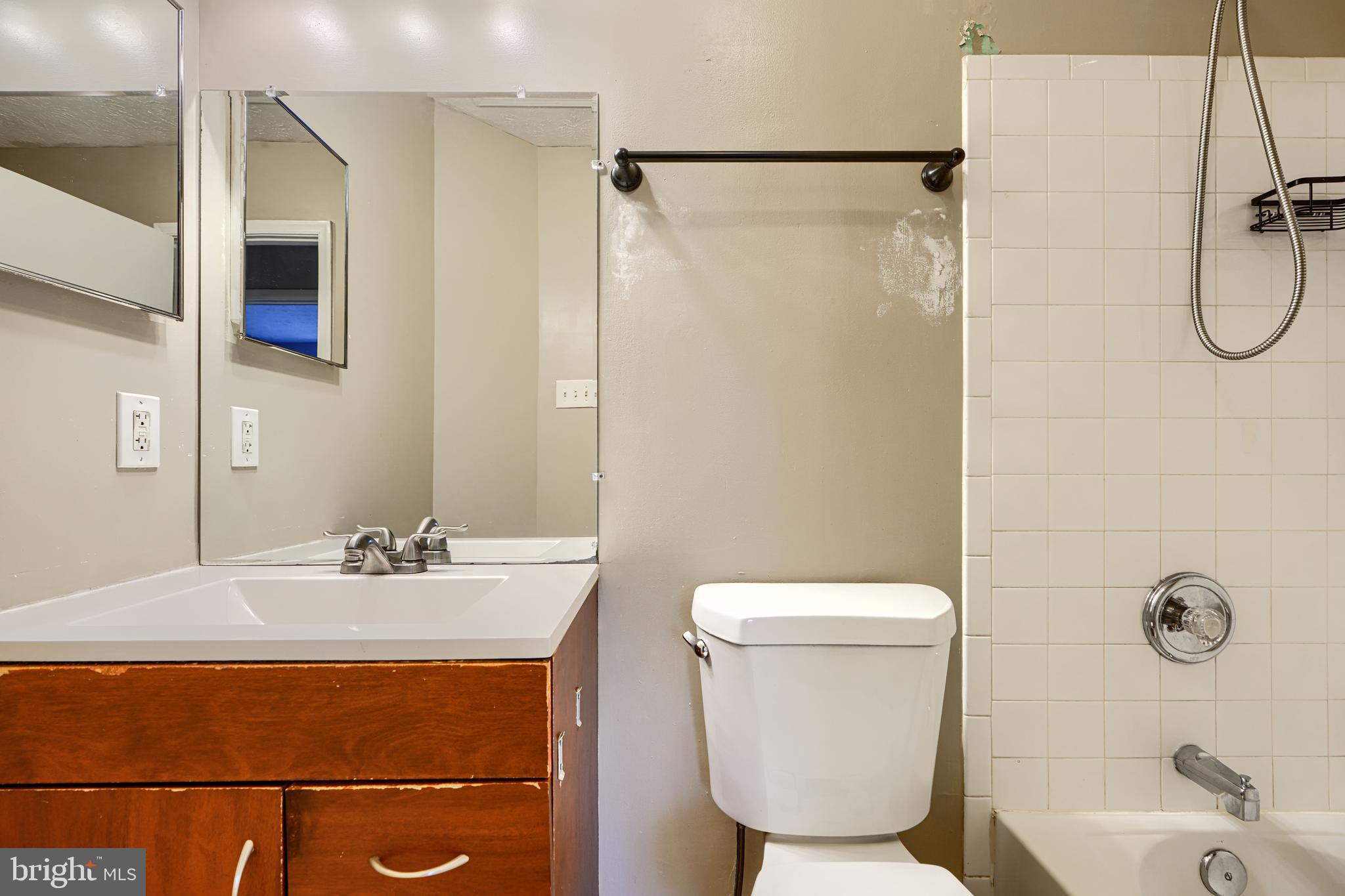 62 Gwynnswood Road Owings Mills, MD 21117 - Photo 34 of 44 a bathroom with a sink a toilet and shower
