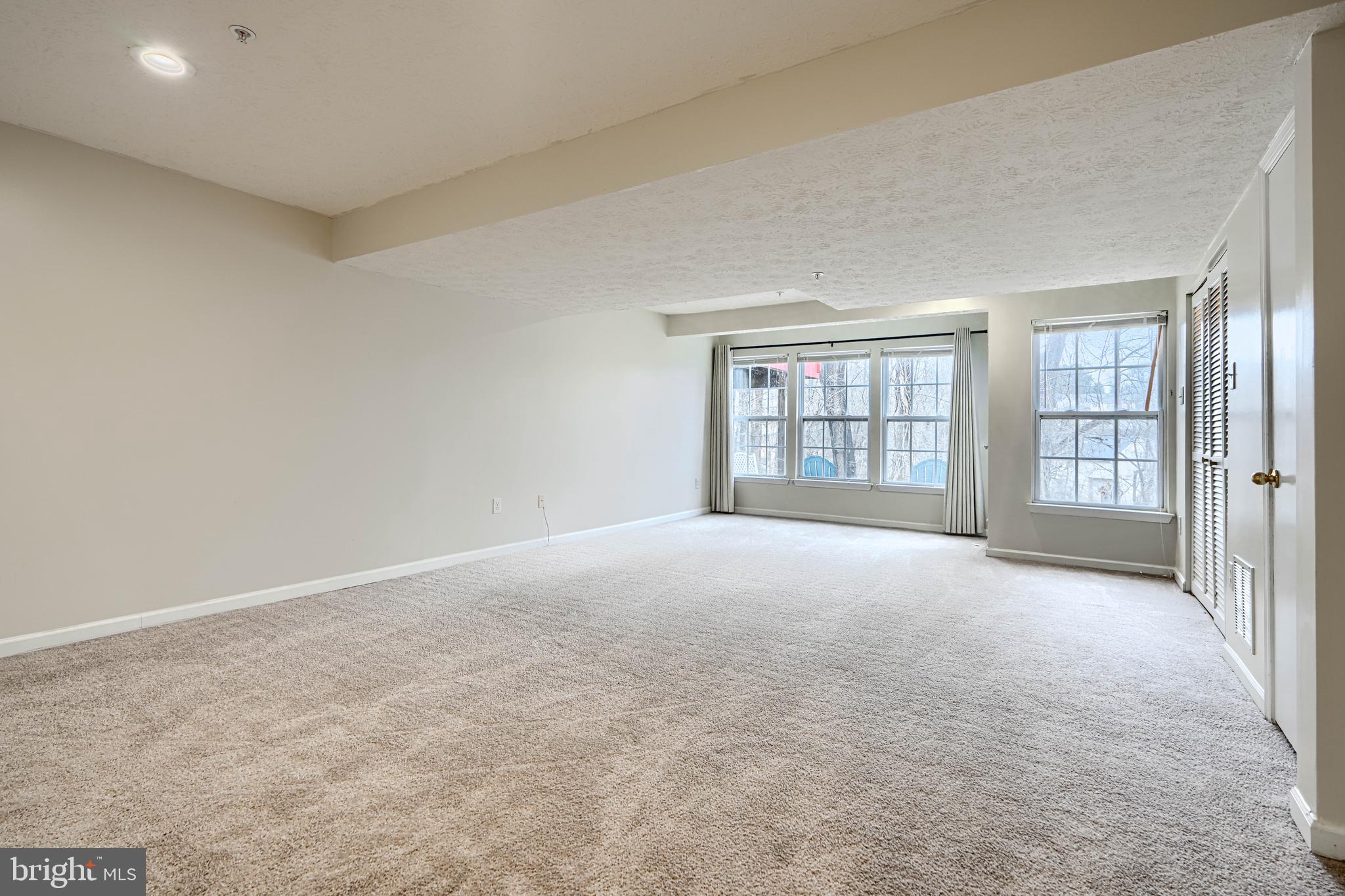 62 Gwynnswood Road Owings Mills, MD 21117 - Photo 40 of 44 an empty room with windows