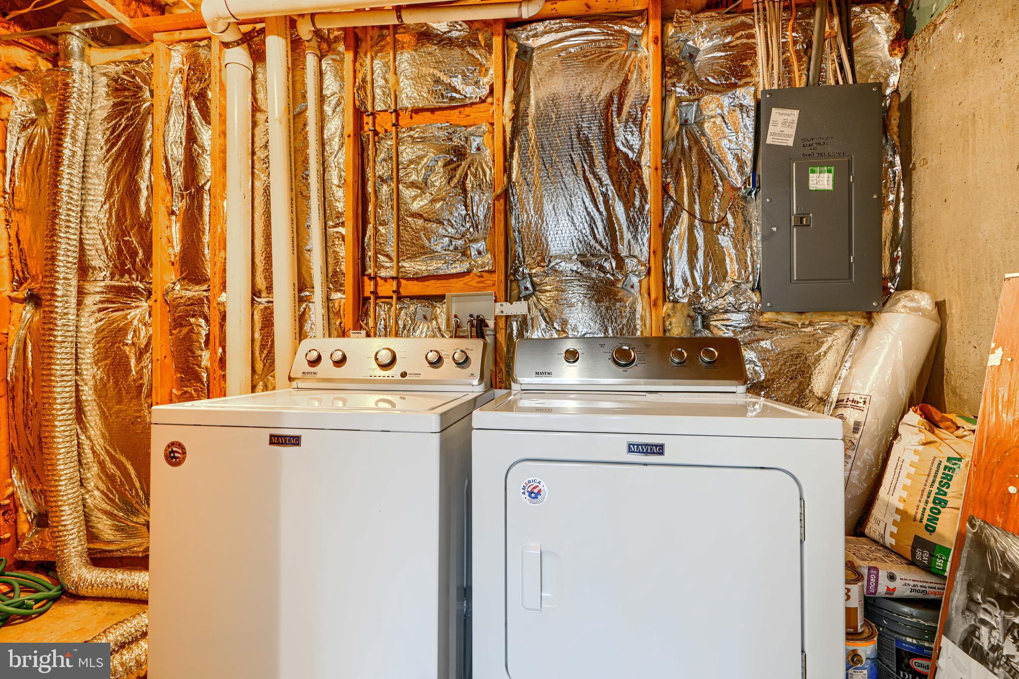62 Gwynnswood Road Owings Mills, MD 21117 - Photo 42 of 44 a utility room with dryer and washer
