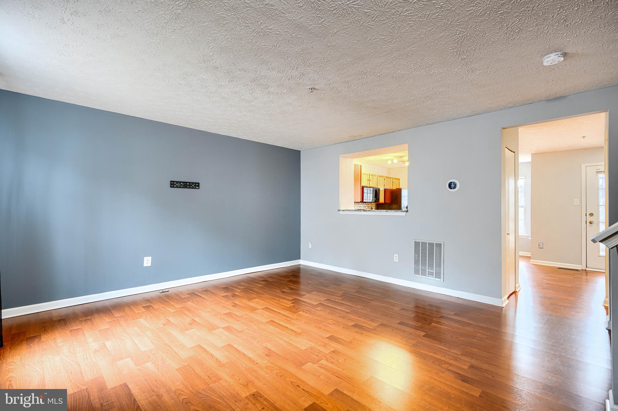 62 Gwynnswood Road Owings Mills, MD 21117 - Photo 6 of 44 a view of empty room with wooden floor