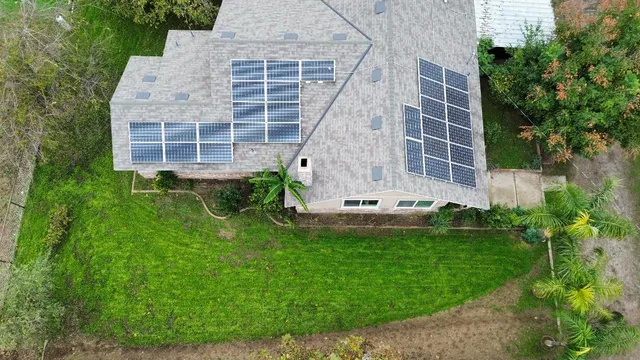 a view of a house with backyard