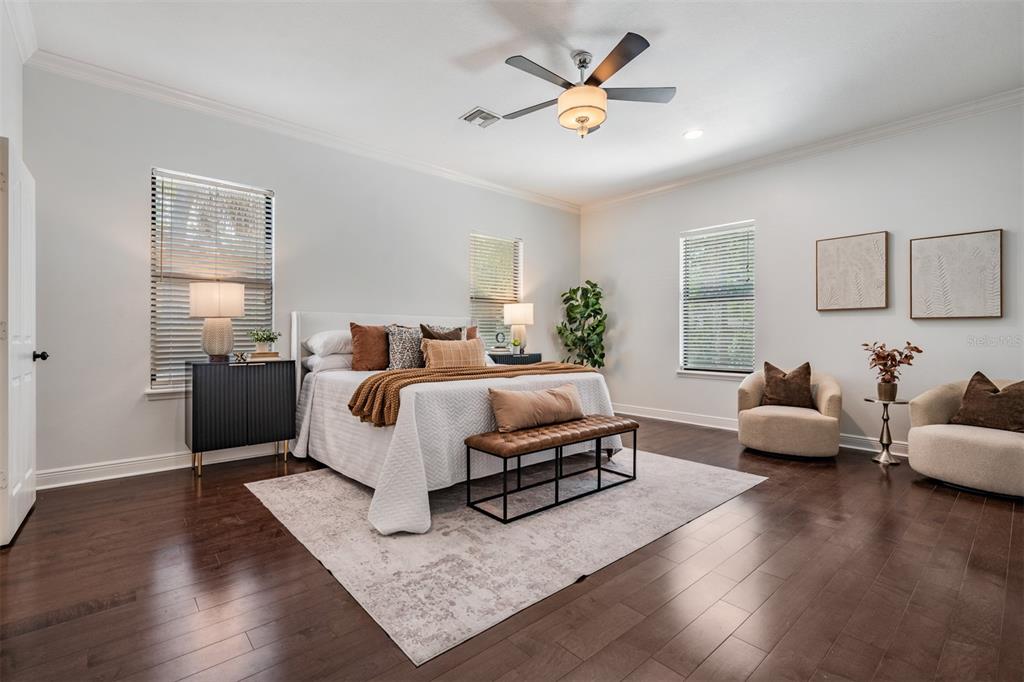 4003 South Shamrock Road Tampa, FL 33611 - Photo 18 of 38 a bedroom with a bed couch and window