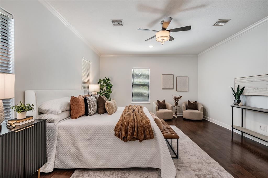 4003 South Shamrock Road Tampa, FL 33611 - Photo 19 of 38 a bedroom with a bed and couch