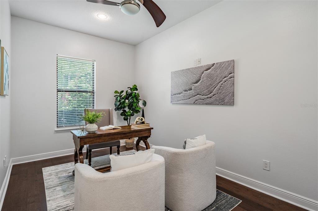 4003 South Shamrock Road Tampa, FL 33611 - Photo 25 of 38 a living room with furniture and a window