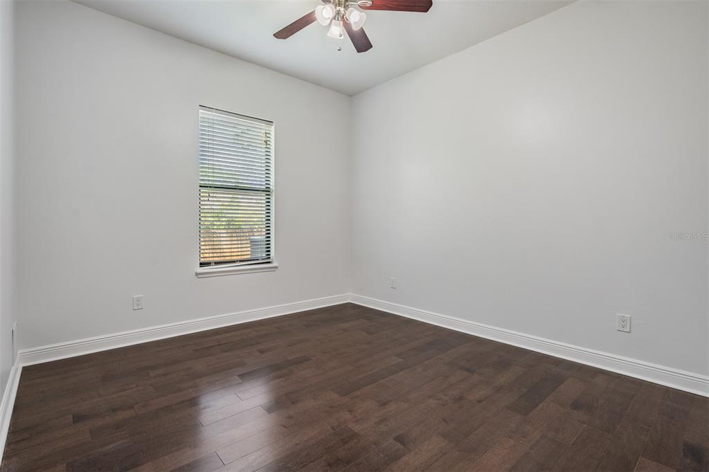 4003 South Shamrock Road Tampa, FL 33611 - Photo 28 of 38 an empty room with a window