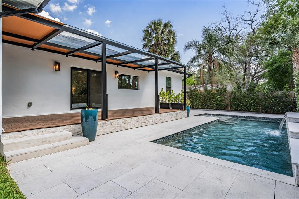 4003 South Shamrock Road Tampa, FL 33611 - Photo 32 of 38 a view of a house with backyard