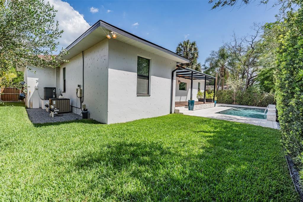 4003 South Shamrock Road Tampa, FL 33611 - Photo 35 of 38 a house view with a garden space
