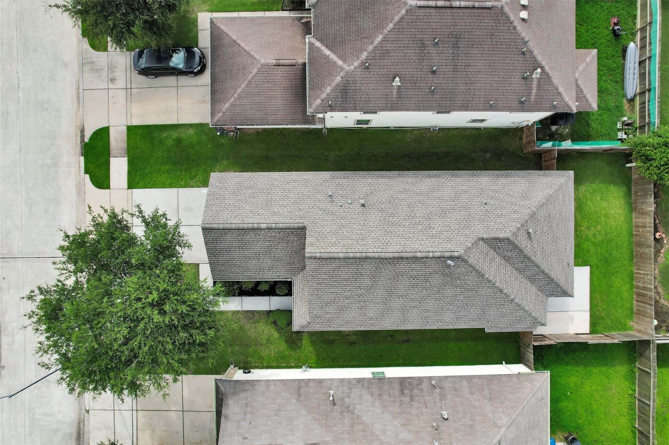 3131 Beacon Grove Street Spring, TX 77389 - Photo 34 of 38 an aerial view of a house with a garden and a yard