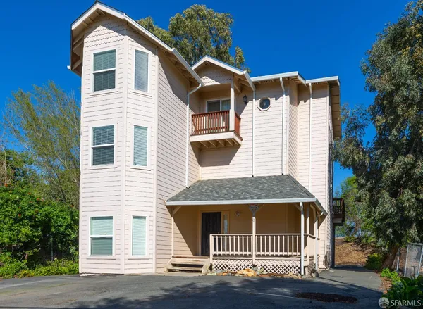 a front view of a house with a porch
