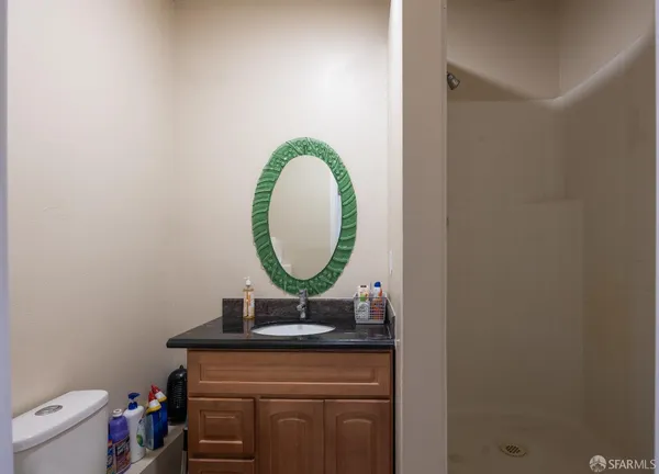 a room with a sink and a mirror