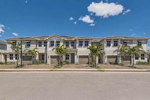 a front view of a building with street view