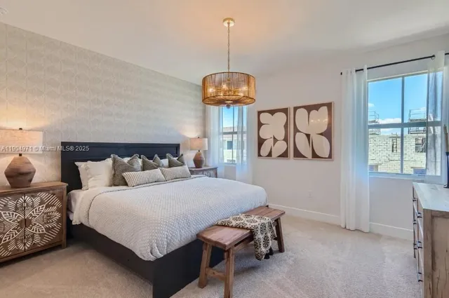 a bedroom with bed and window