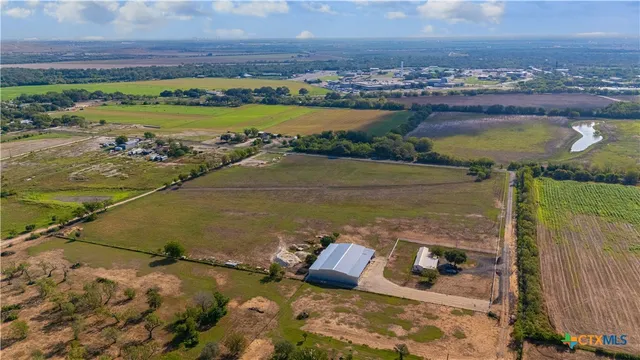 a view of a lake with a yard