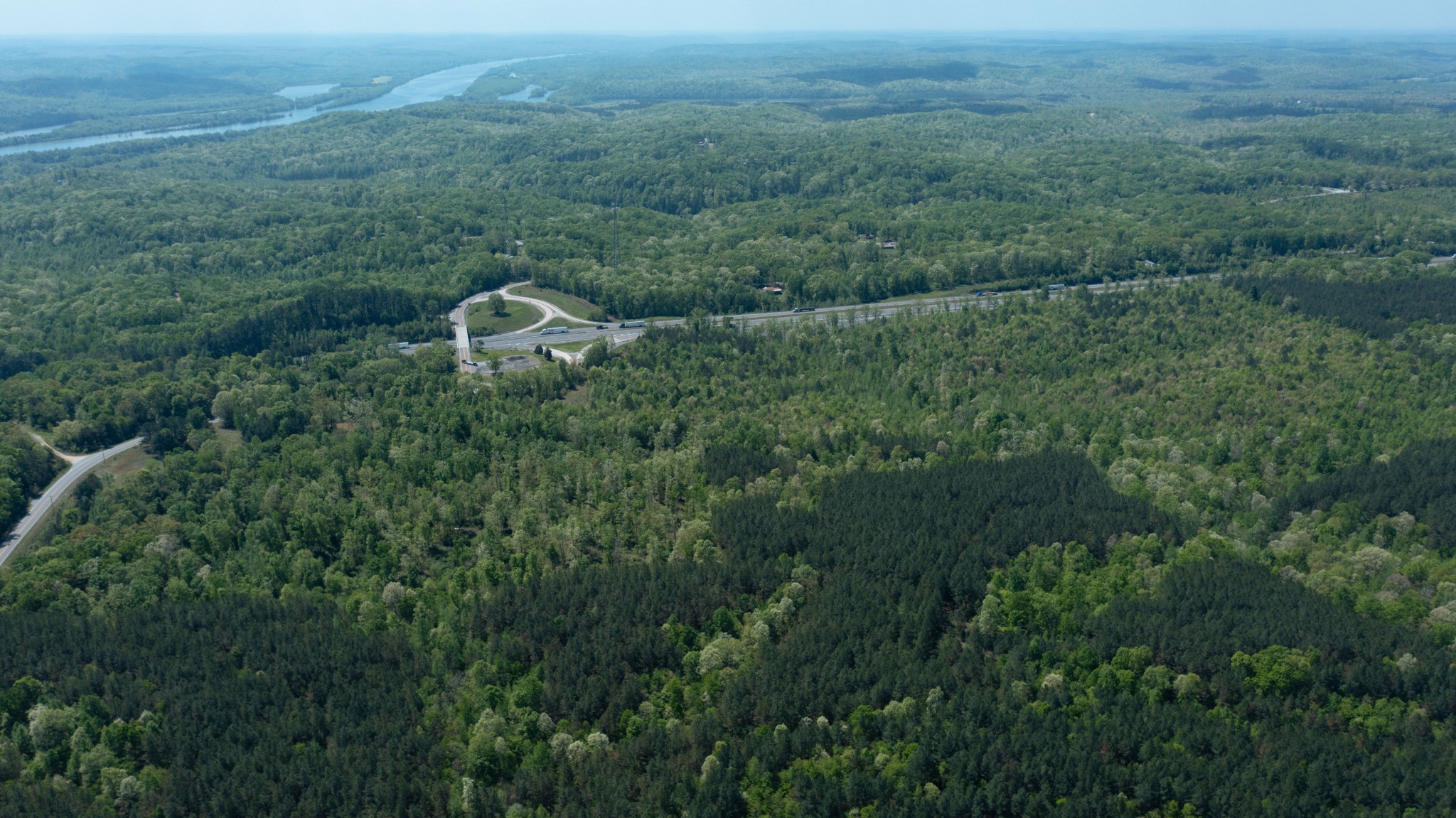 2 Birdsong Road North Holladay, TN 38341 - Photo 5 of 11 an aerial view of residential house with outdoor space and trees all around