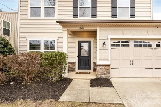 a black and white house with outdoor space