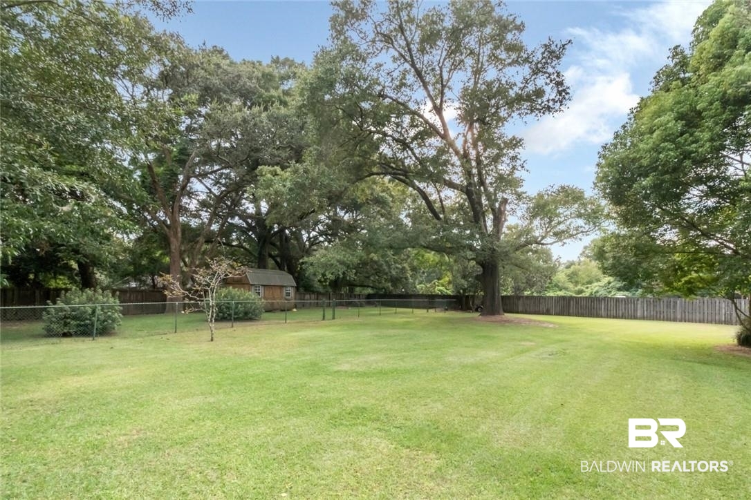 8837 Dawes Lake Road South Mobile, AL 36619 - Photo 3 of 44 View of yard with a shed