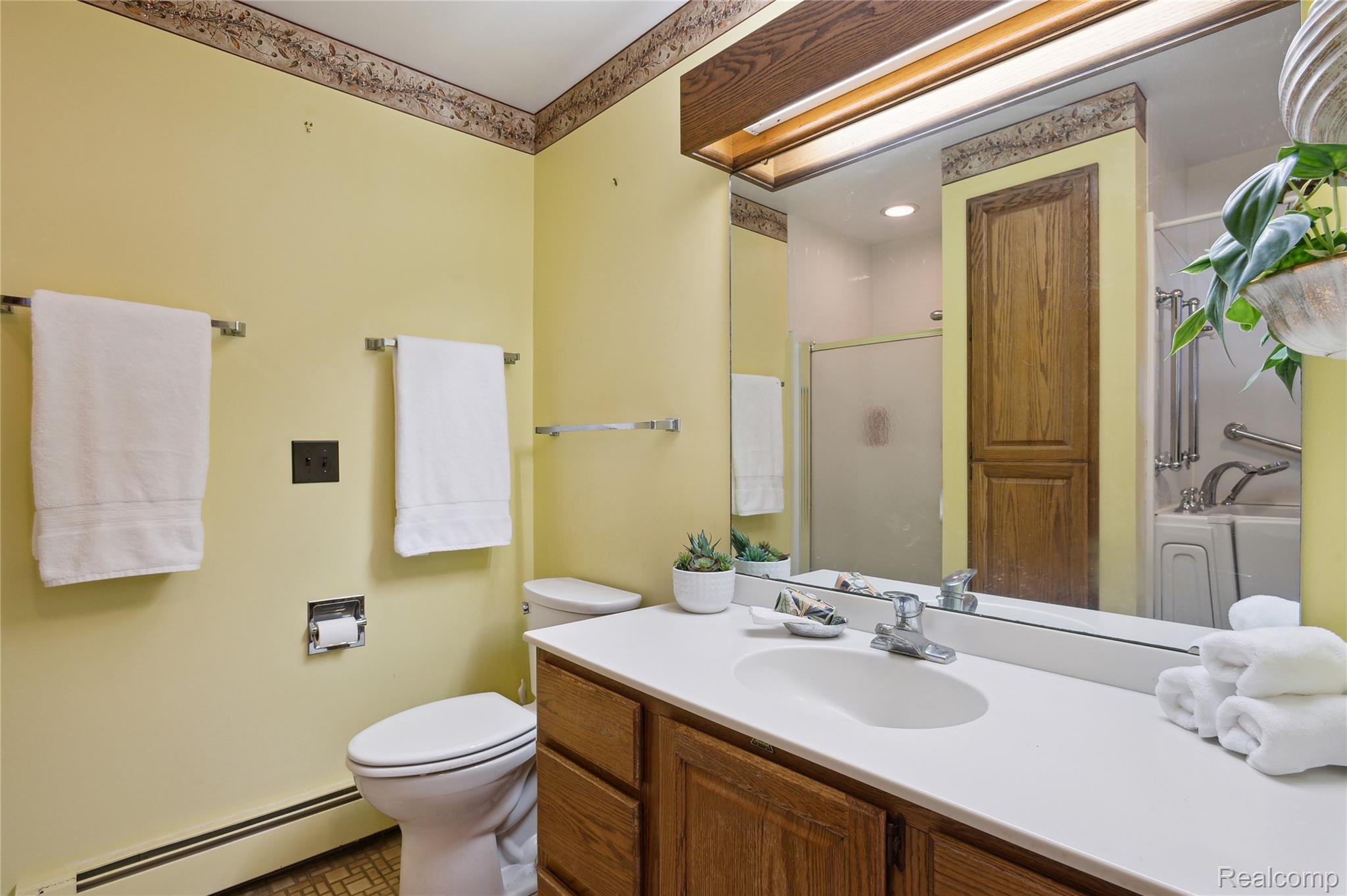4300 West Bacon Road Hillsdale, MI 49242 - Photo 22 of 49 Hall Bathroom with Spacious Vanity.