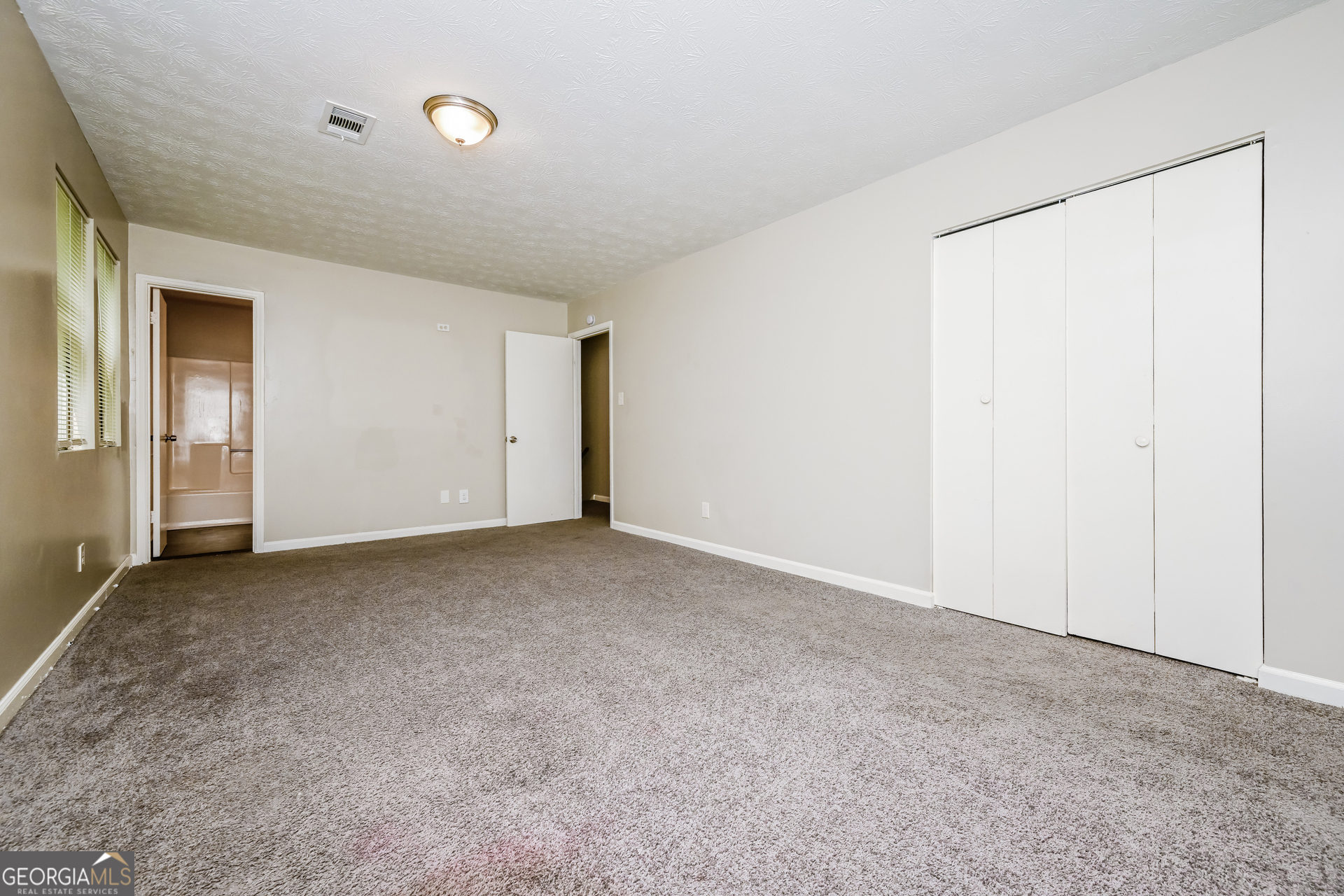 4301 Dogwood Farms Drive Decatur, GA 30034 - Photo 11 of 22 a view of an empty room with closet and entryway
