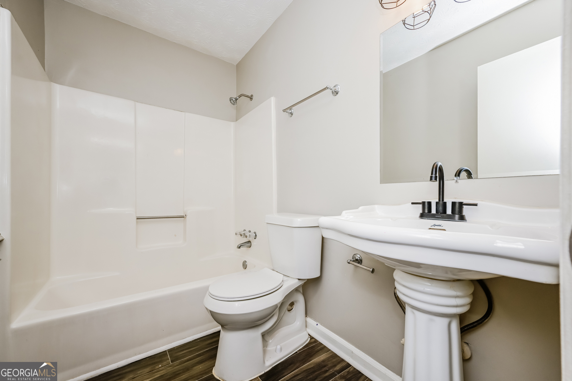 4301 Dogwood Farms Drive Decatur, GA 30034 - Photo 12 of 22 a bathroom with a sink a toilet and shower