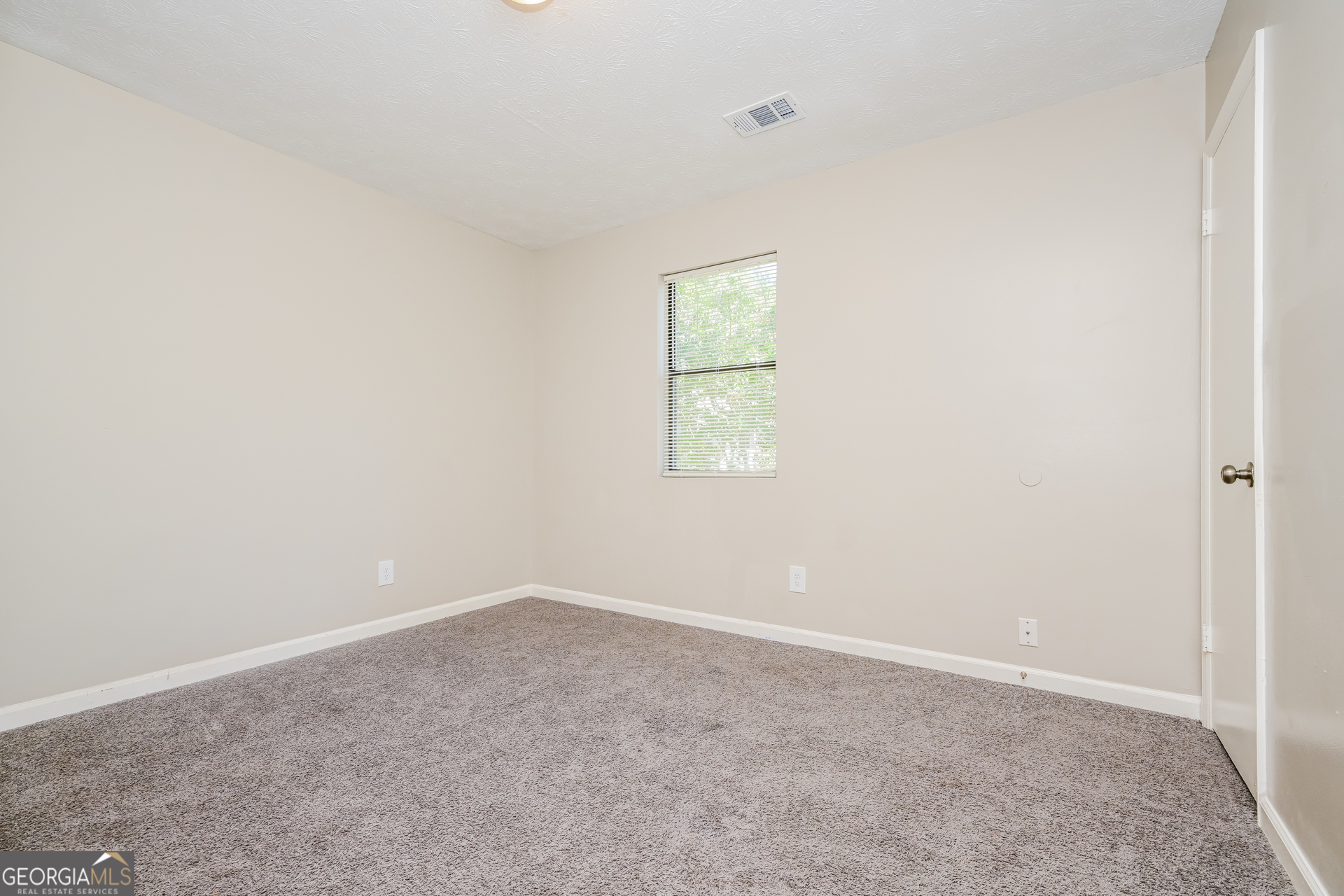 4301 Dogwood Farms Drive Decatur, GA 30034 - Photo 13 of 22 an empty room with a window