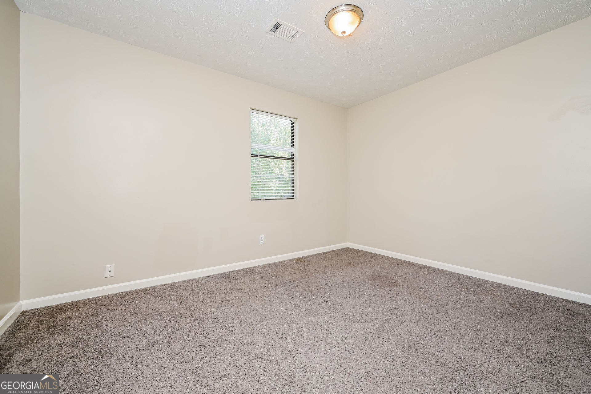 4301 Dogwood Farms Drive Decatur, GA 30034 - Photo 15 of 22 an empty room with a window