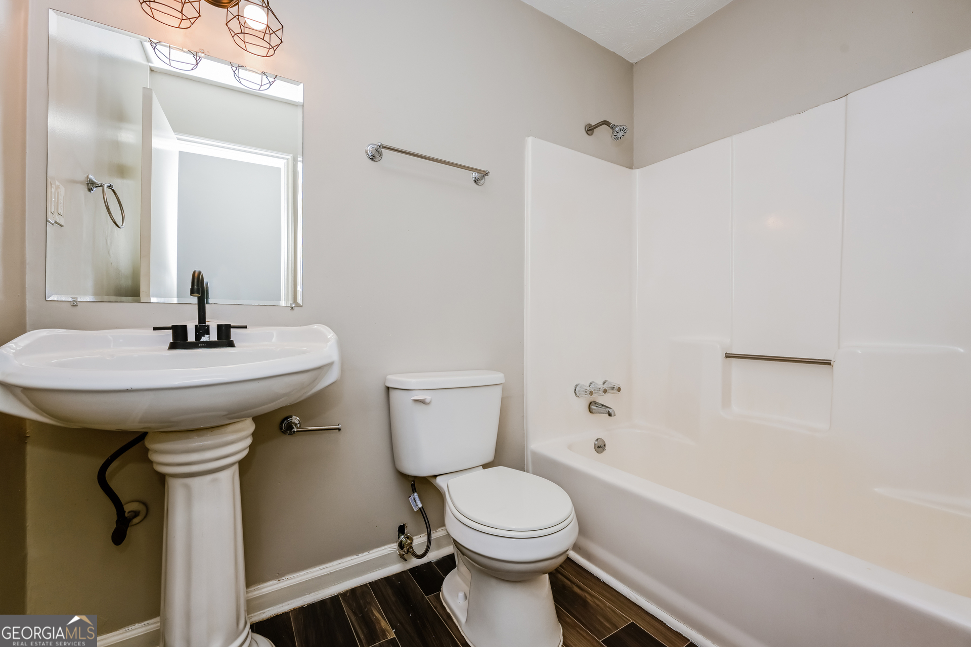 4301 Dogwood Farms Drive Decatur, GA 30034 - Photo 16 of 22 a bathroom with a sink a toilet and shower