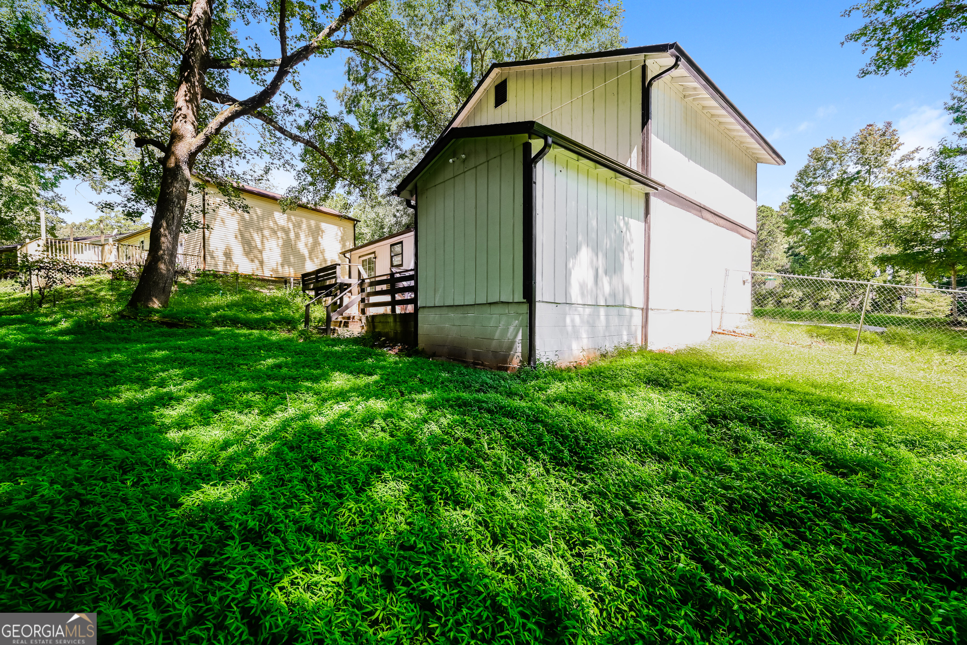 4301 Dogwood Farms Drive Decatur, GA 30034 - Photo 17 of 22 a view of a backyard with large trees
