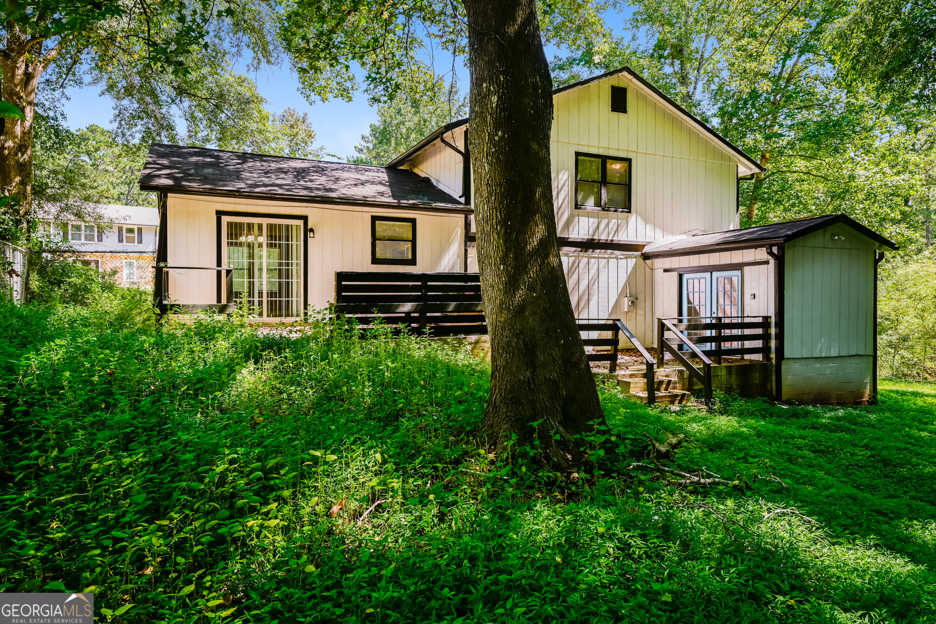 4301 Dogwood Farms Drive Decatur, GA 30034 - Photo 19 of 22 a view of front of a house with a yard
