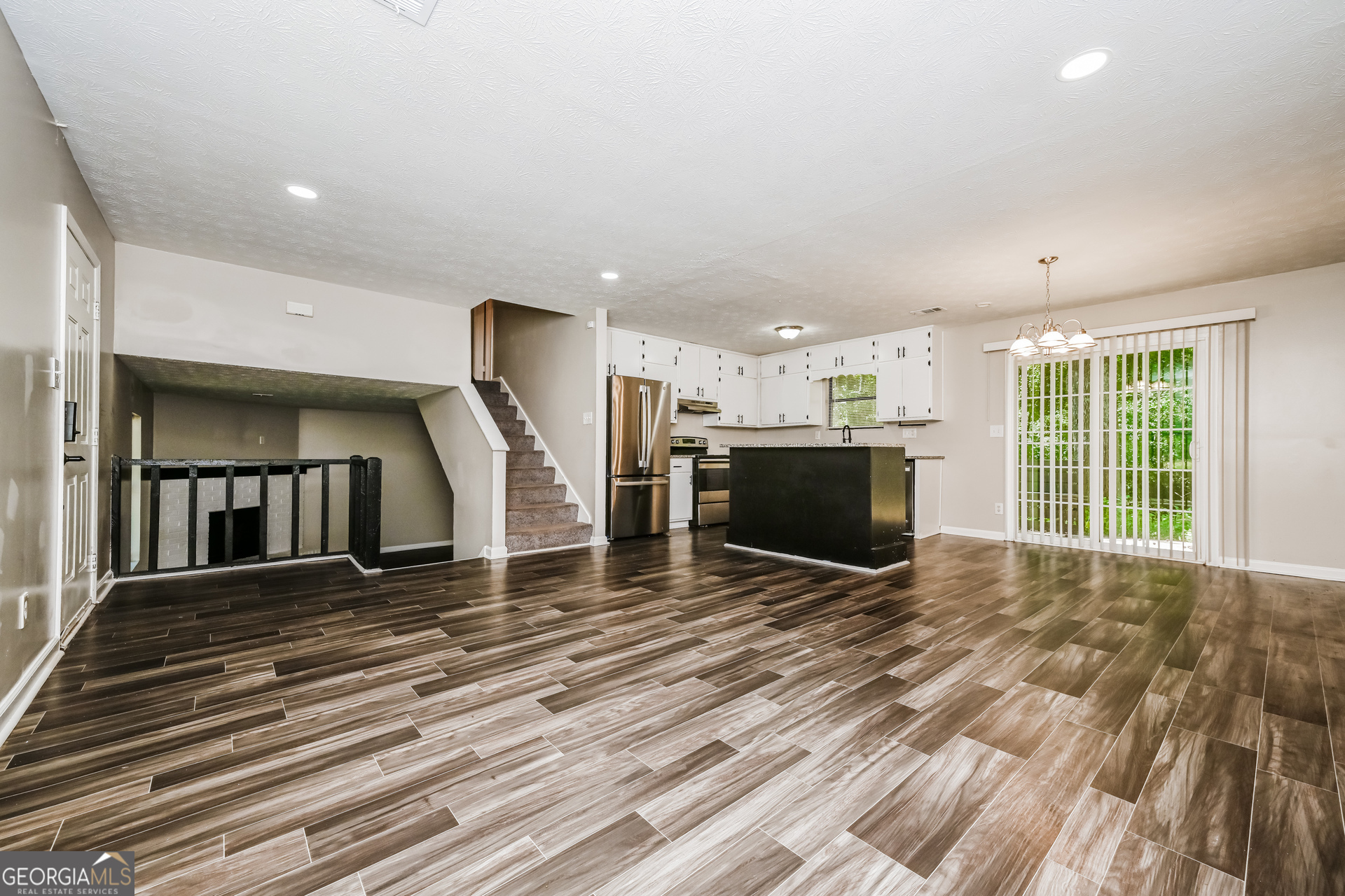 4301 Dogwood Farms Drive Decatur, GA 30034 - Photo 4 of 22 a view of a livingroom with furniture wooden floor and windows