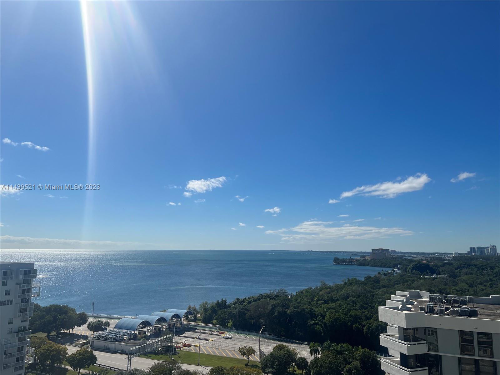 a view of a lake with a city