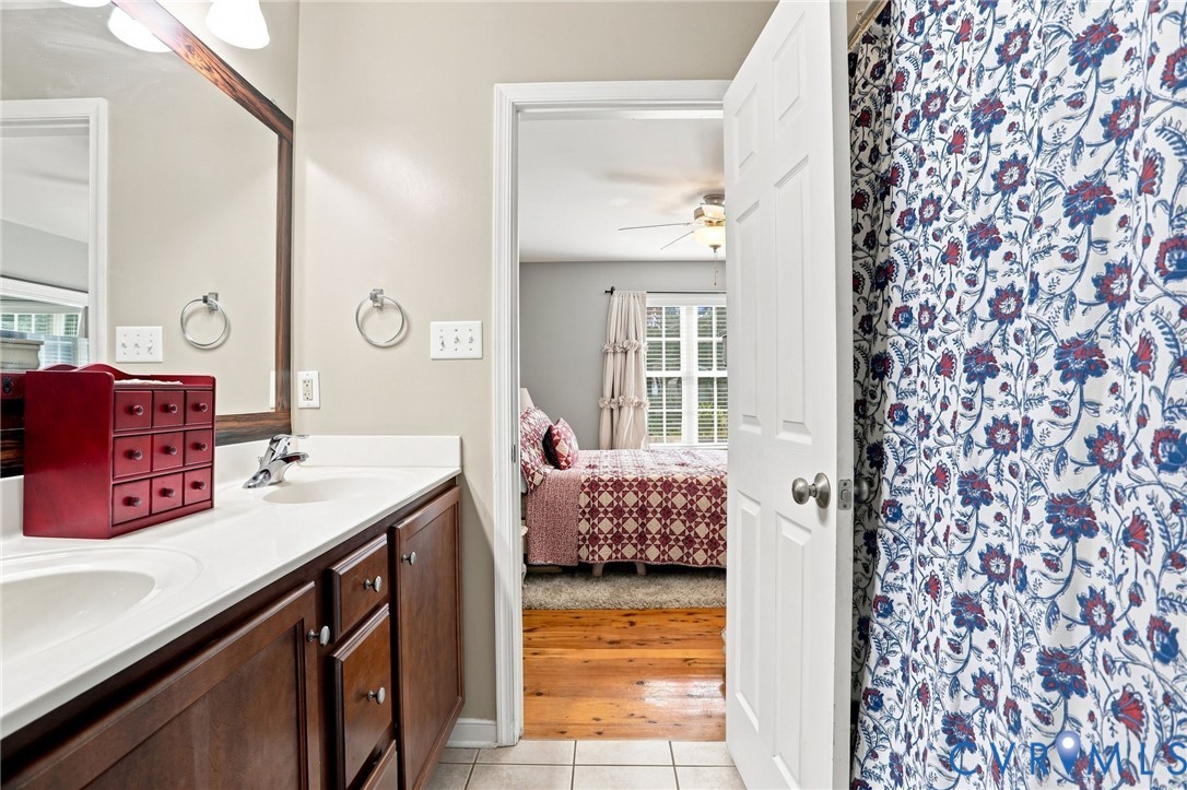 6401 Poplar Road Quinton, VA 23141 - Photo 18 of 46 Bathroom vanity with dual undermount sinks, white