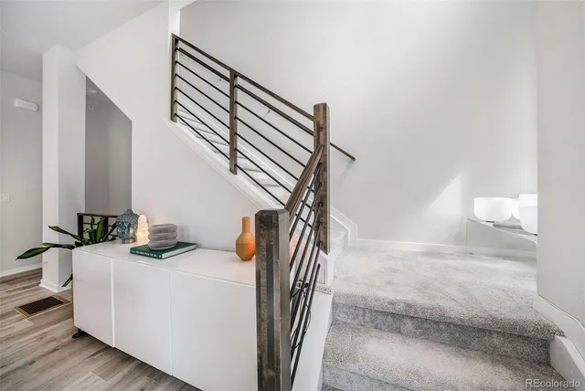 a view of a swimming pool with outdoor seating