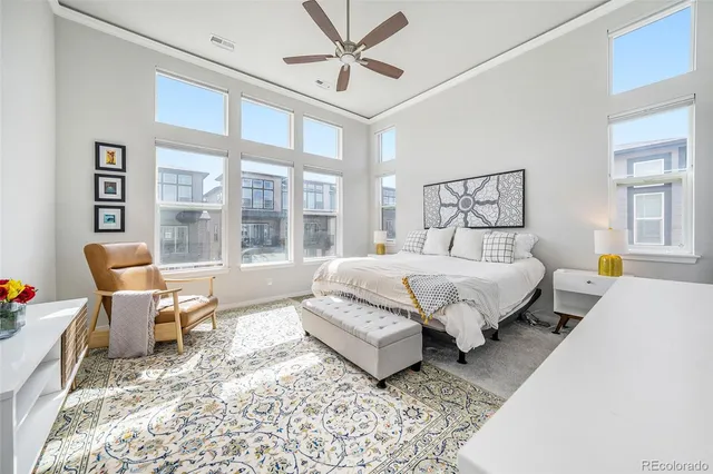 a view of a house with swimming pool and sitting area