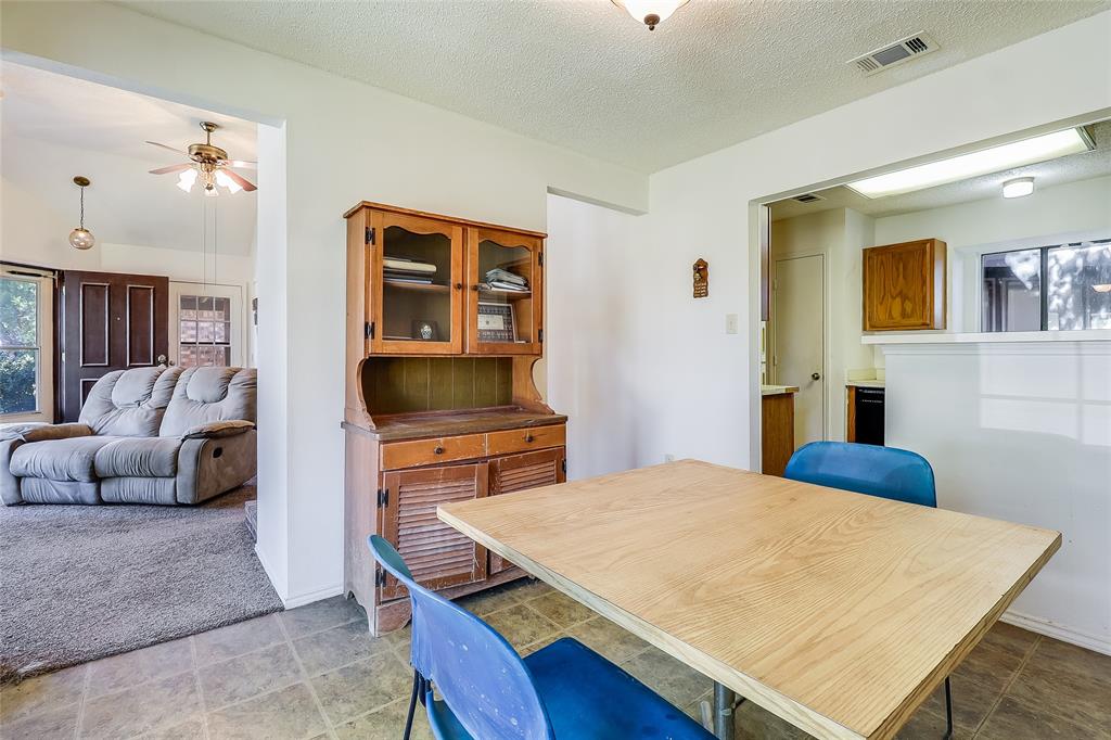 1728 Hackamore Street Mesquite, TX 75149 - Photo 7 of 22 a living room with furniture and a flat screen tv