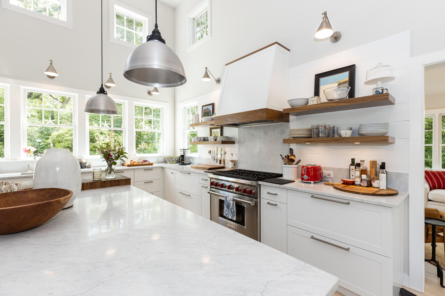 145 Henry's Road Brewster, MA 02631 - Photo 12 of 54 a kitchen with a stove a workspace and a window
