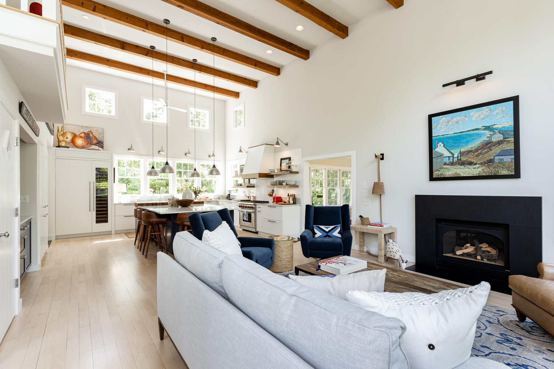 145 Henry's Road Brewster, MA 02631 - Photo 16 of 54 a living room with furniture fireplace and a large window