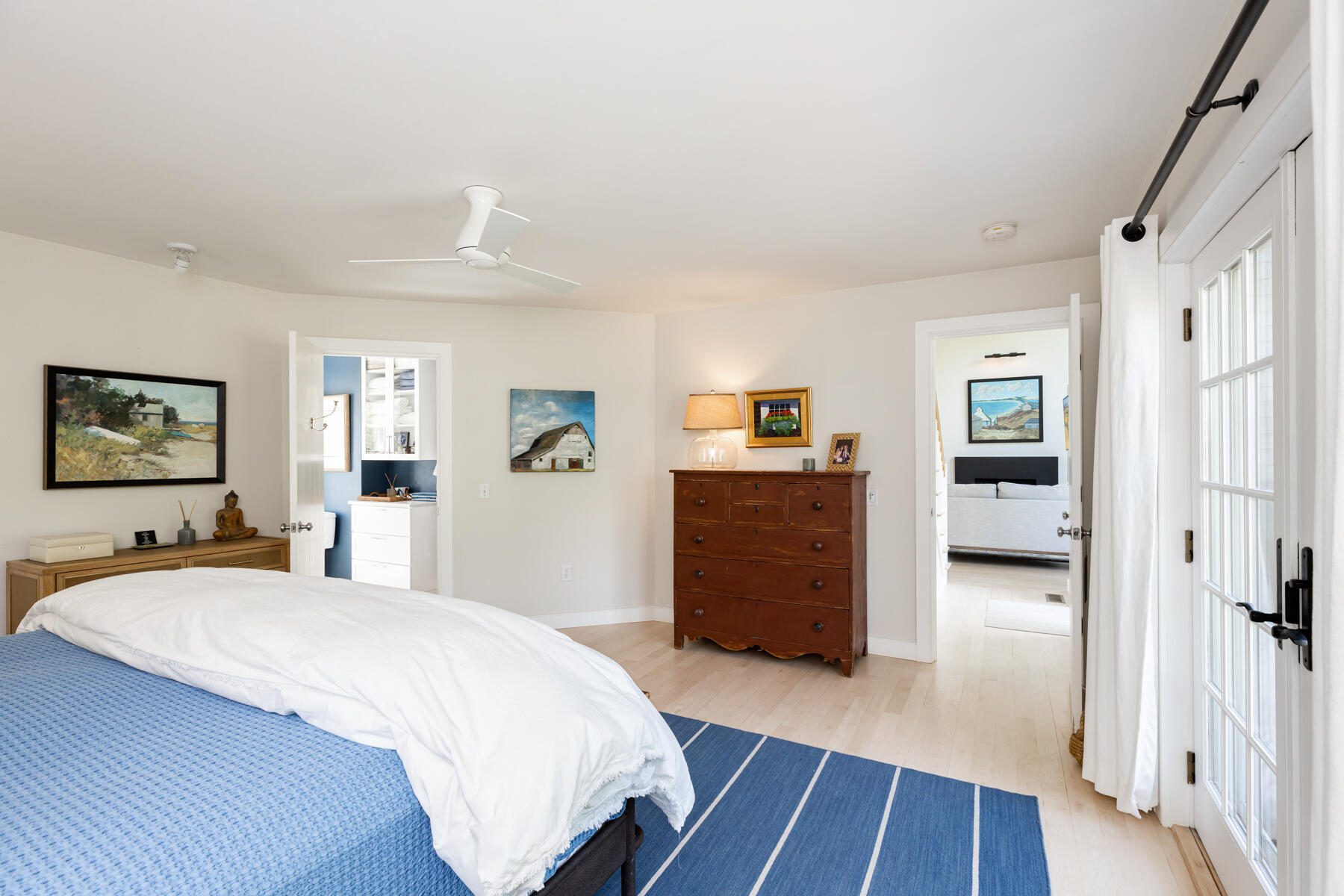 145 Henry's Road Brewster, MA 02631 - Photo 20 of 54 a bedroom with a bed and a dresser