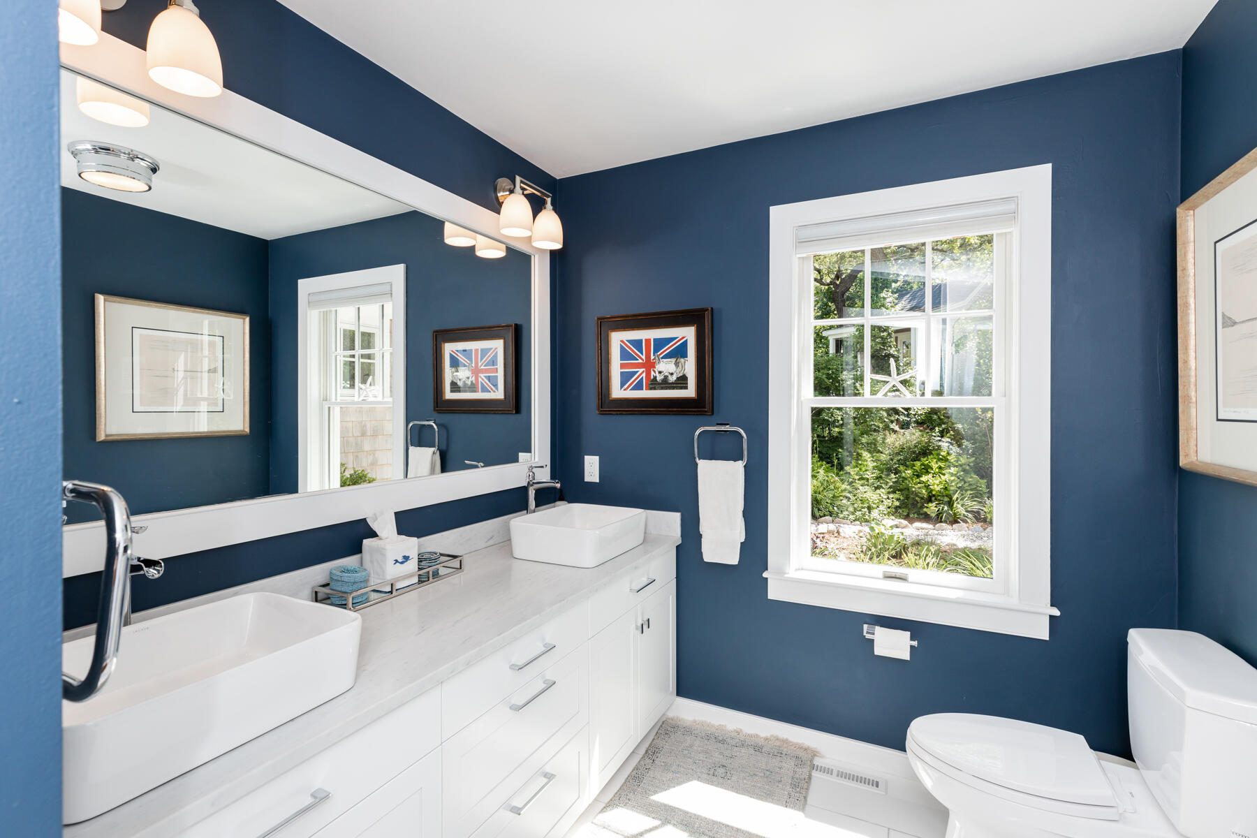 145 Henry's Road Brewster, MA 02631 - Photo 22 of 54 a bathroom with a granite countertop sink mirror and a bathtub