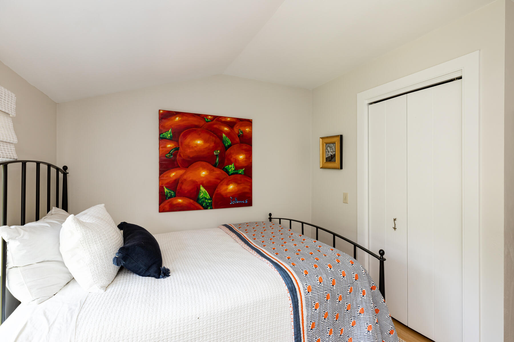 145 Henry's Road Brewster, MA 02631 - Photo 30 of 54 a bedroom with a bed and a wall painting