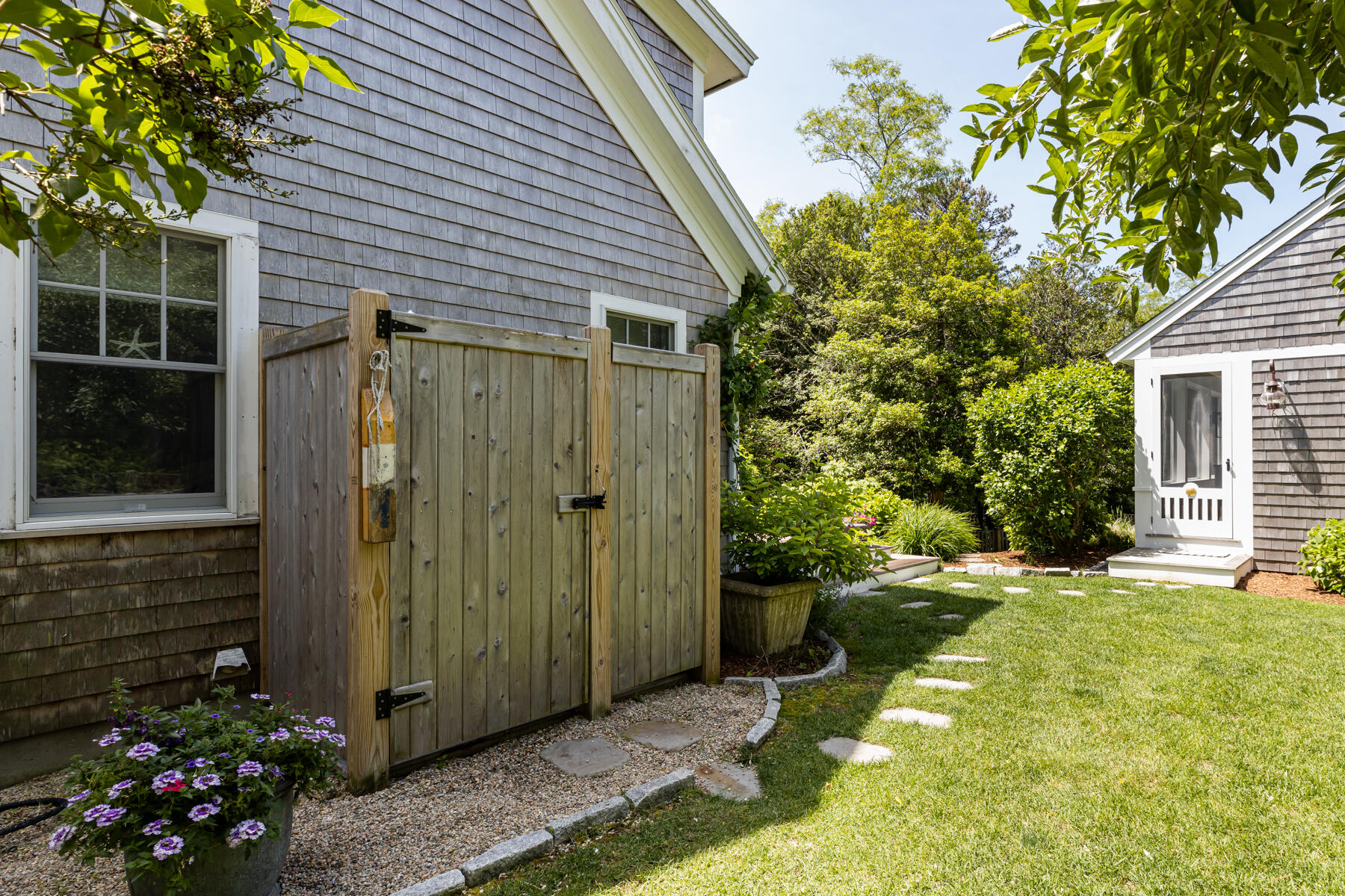 145 Henry's Road Brewster, MA 02631 - Photo 42 of 54 a view of a house with backyard and garden