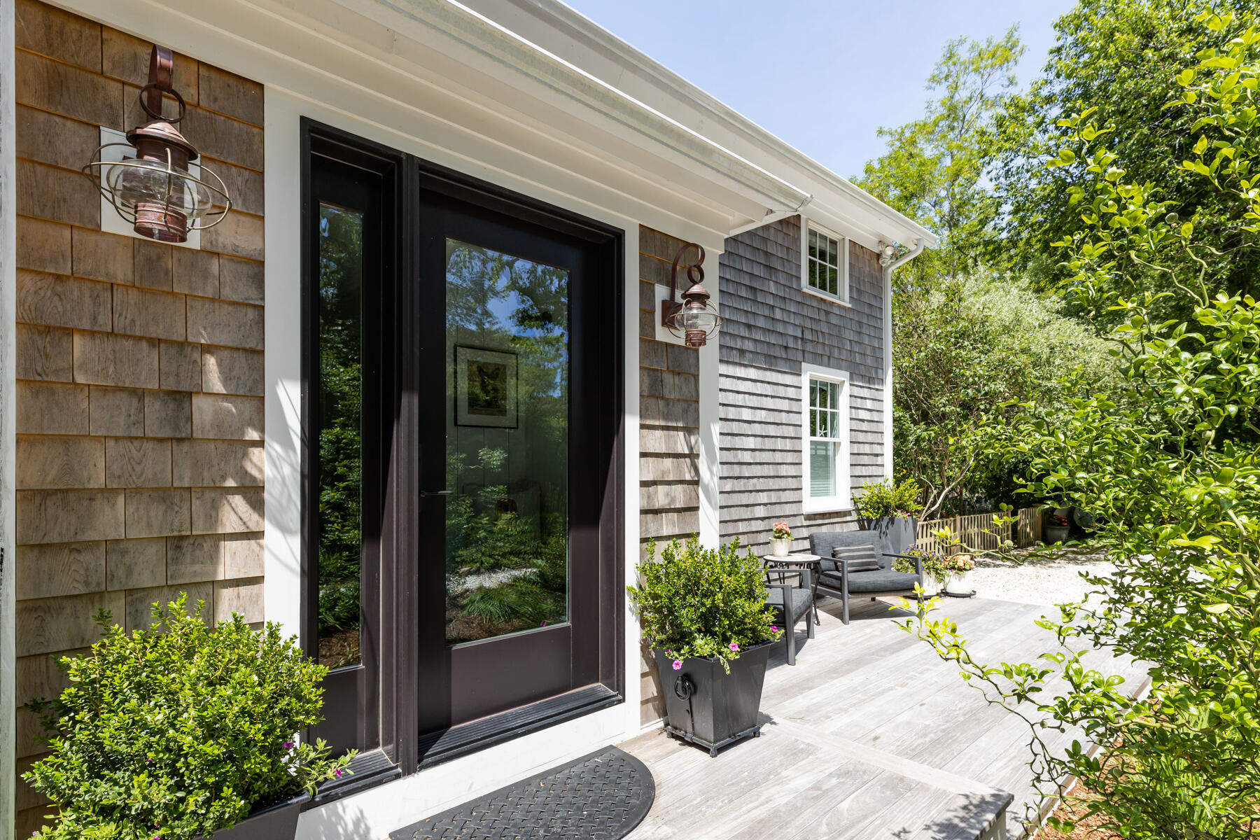 145 Henry's Road Brewster, MA 02631 - Photo 47 of 54 a view of a house with potted plants