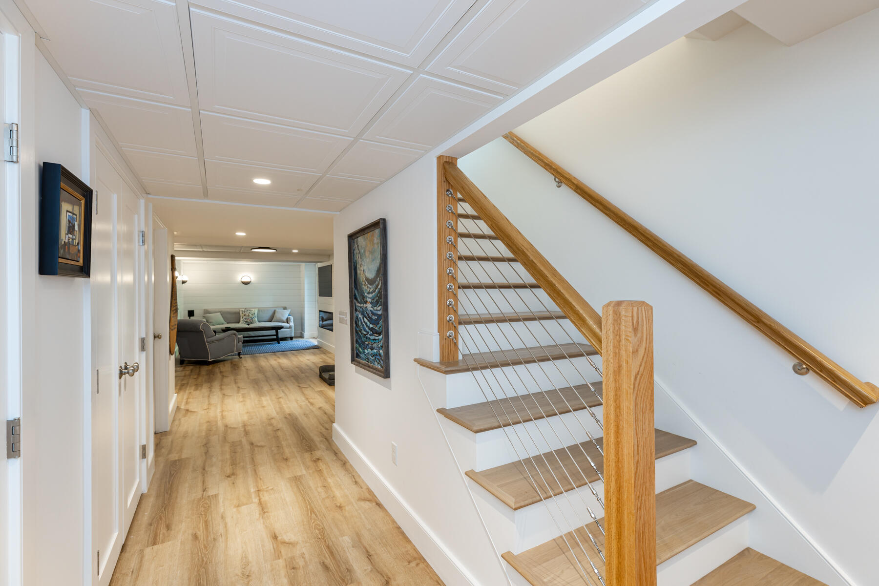 145 Henry's Road Brewster, MA 02631 - Photo 48 of 54 a view of a livingroom with wooden floor and staircase