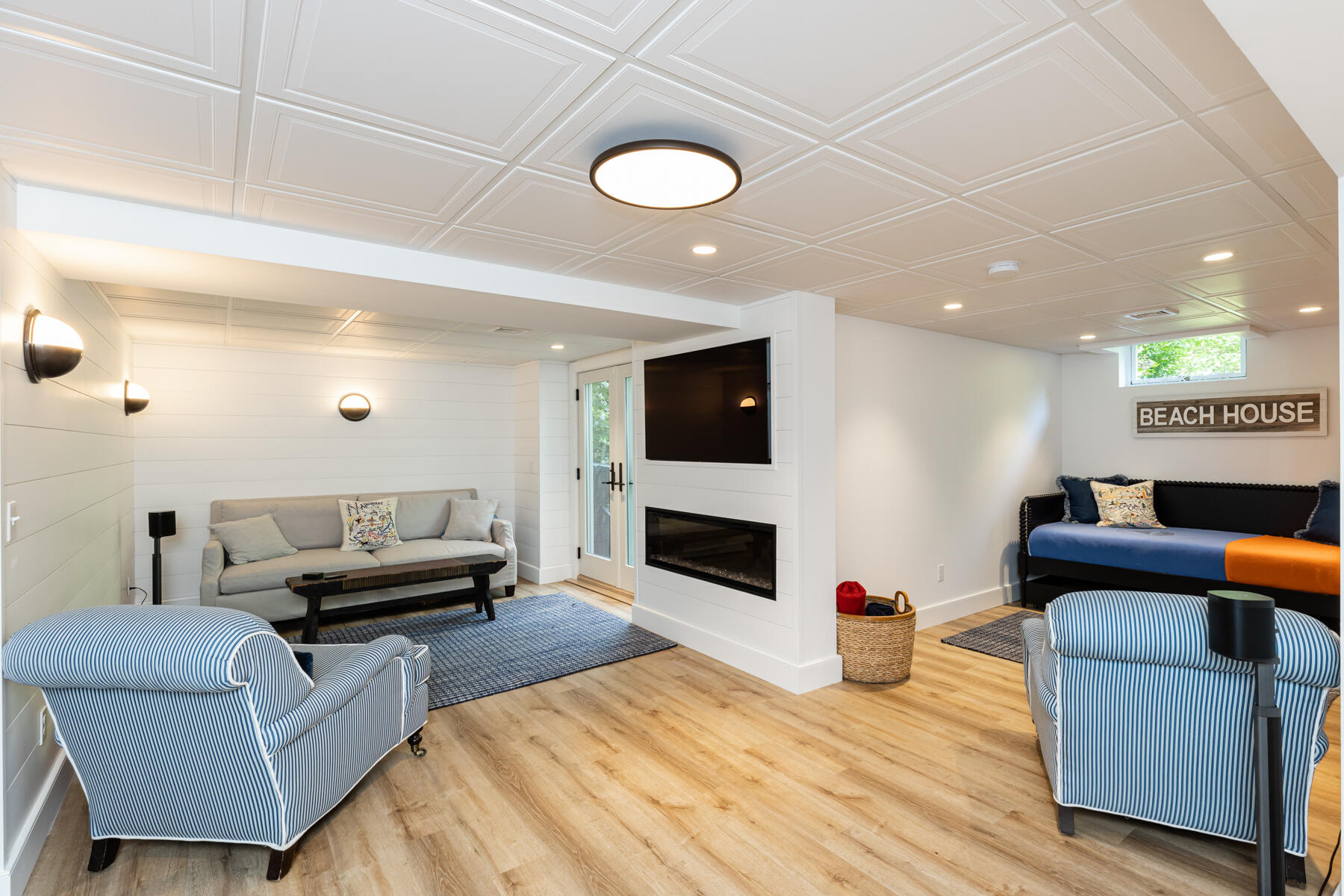 145 Henry's Road Brewster, MA 02631 - Photo 50 of 54 a living room with furniture and a flat screen tv